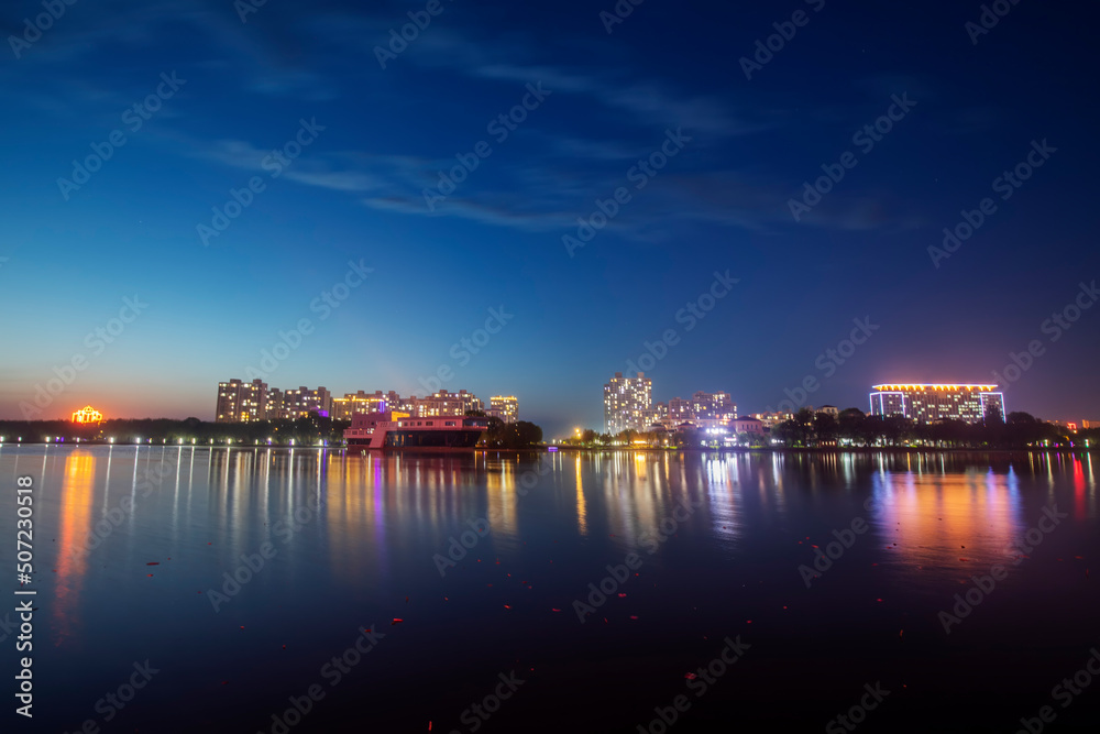 Naklejka premium Night view of waterfront city, North China