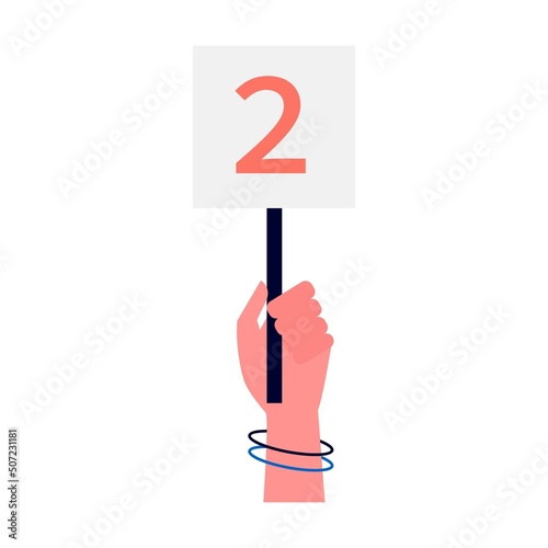 Jury hand showing card with amount of 2. Collection of scorecards in human hands, competition judges giving evaluation