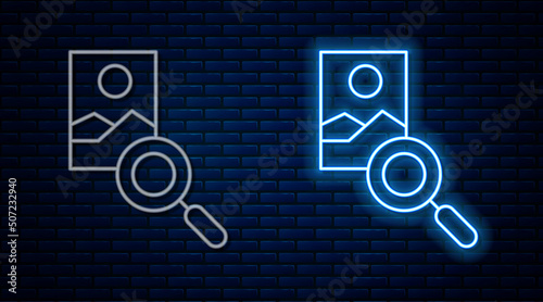 Glowing neon line Photo retouching icon isolated on brick wall background. Photographer, photography, retouch icon. Vector