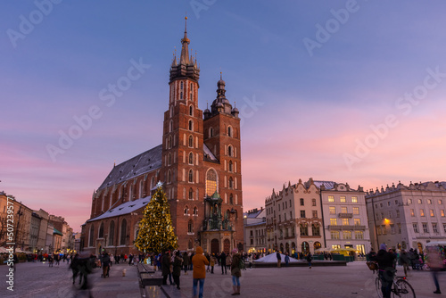 Sunset over the St. Mary's Basilica in Rynek Glowny square, Krakow, Poland