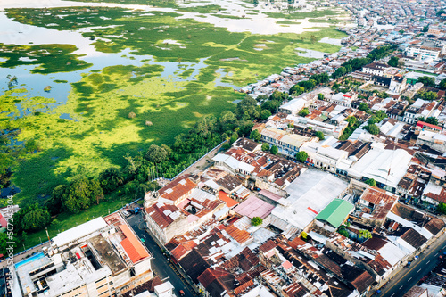 Aerial view of Iquitos, Peru with the Itaya River in the background in the middle of the Amazon Rainforest. photo