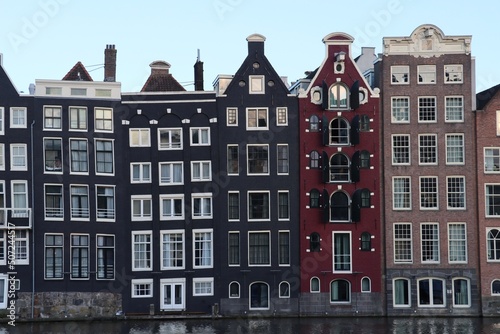 houses in front of the canal in Amsterdam 