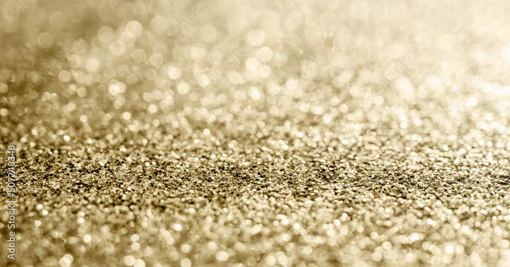 Abstract gold glitter sparkle with bokeh background Abstract gold glitter sparkle with bokeh background