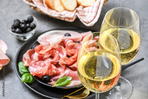 Obraz na płótnie Food aperitif  prosciutto ham, parma ham, salami, olives and  bread