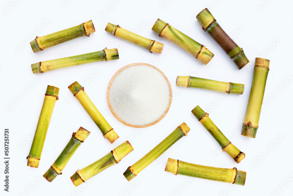 Sugar with sugar cane on white background. Sugar with sugar cane on white background.