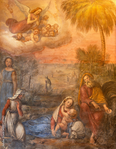 FERRARA, ITALY - NOVEMBER 9, 2021: The painting Flight into Egypt in the church Chiesa di San Francesco by Girolamo Domenichini from 19. cent.