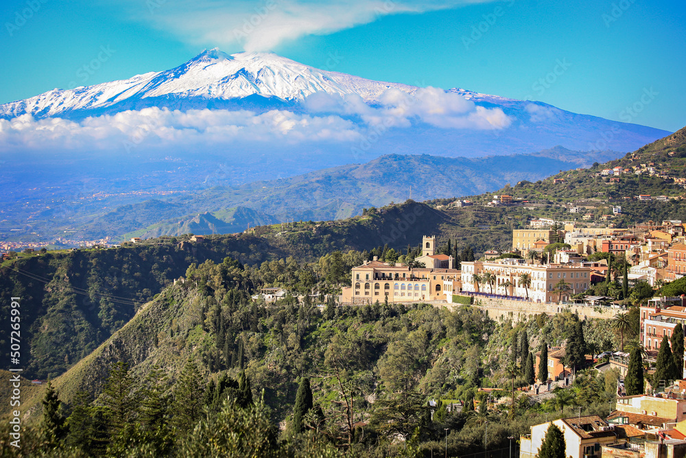 View of Etna Mount from Taormina teatro greco on sunny day, Sicily, Italy View of Etna Mount from Taormina teatro greco on sunny day, Sicily, Italy