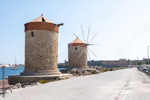 The medieval windmills in Mandraki harbour in Rhodes, Greece