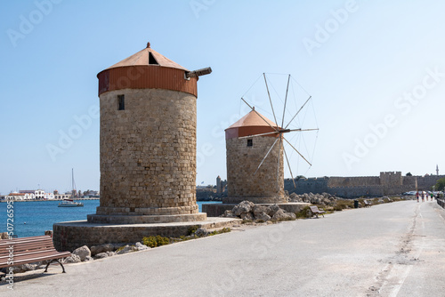 The medieval windmills in Mandraki harbour in Rhodes, Greece