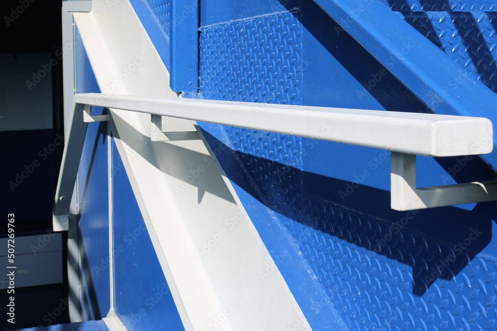 Obraz premium Rectangular steel tubing railing structure installed on wall.