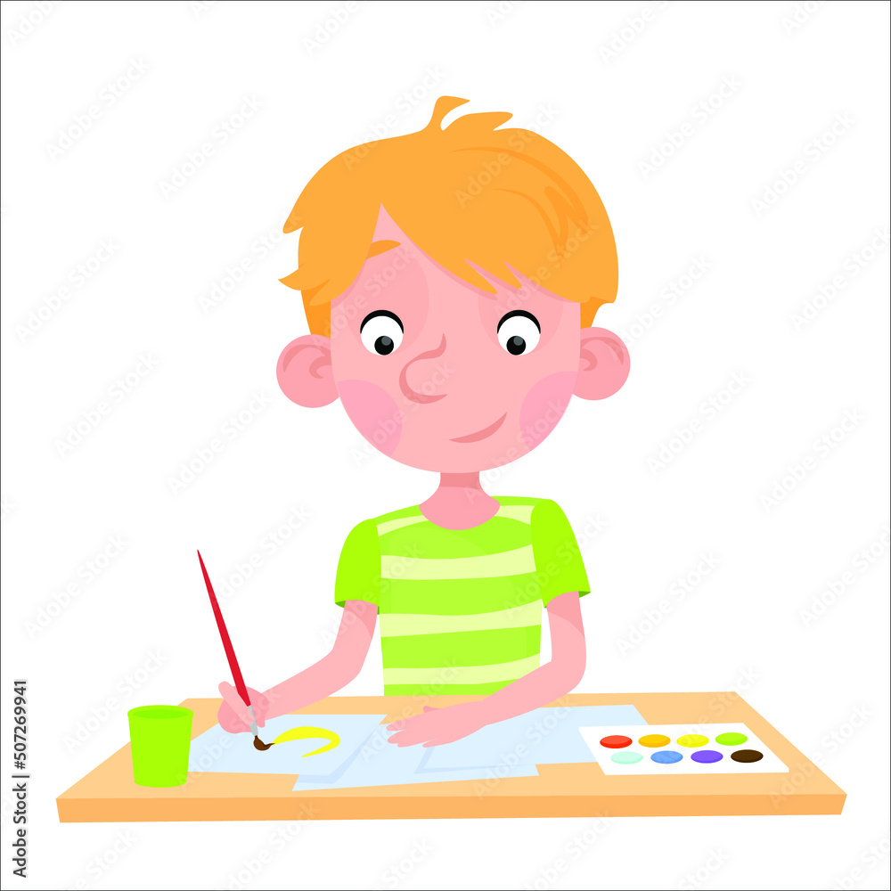 A boy with blond hair sits at a table and draws with a brush and paints