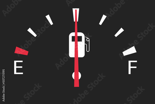 gasoline fuel gauge in a car at an average value