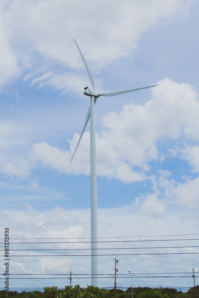 Large wind turbines provide a beautiful sky backdrop. alternative energy concept, clean energy, wind energy