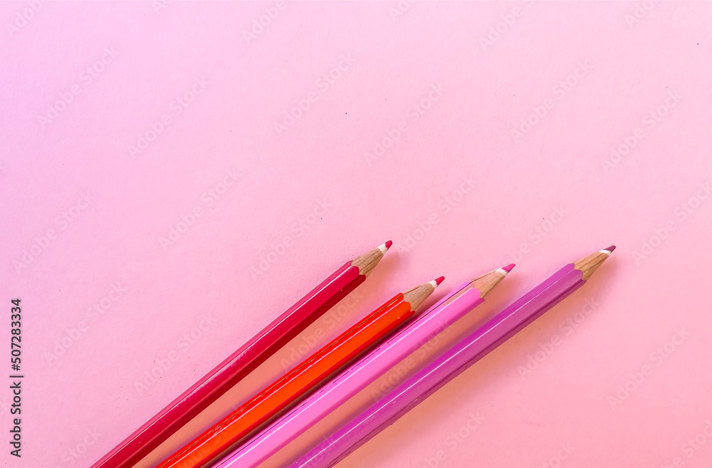 Pink pencils with copy space on pink background Pink pencils with copy space on pink background
