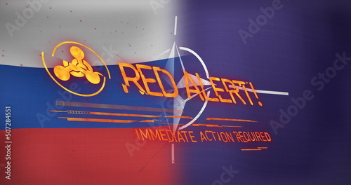 Image of red alert text and symbol over flags of russia and nato