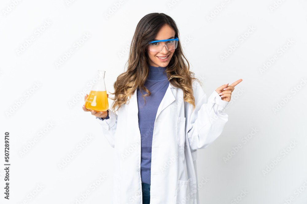 Young scientific woman isolated on white background pointing finger to the side Young scientific woman isolated on white background pointing finger to the side