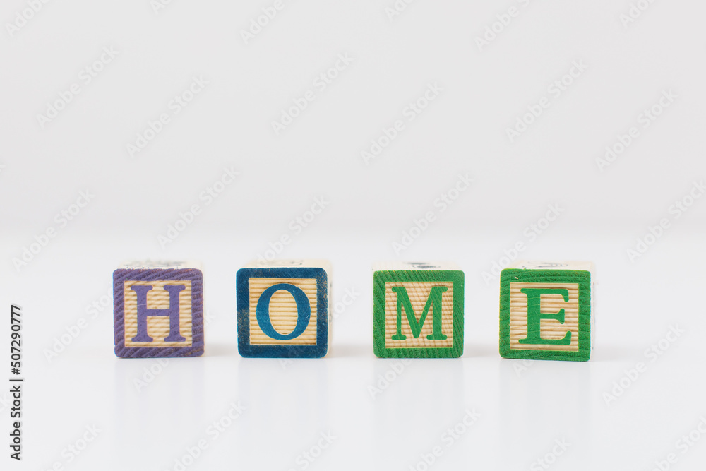 An arrangement of children painted alphabet wooden blocks spelling out An arrangement of children painted alphabet wooden blocks spelling out