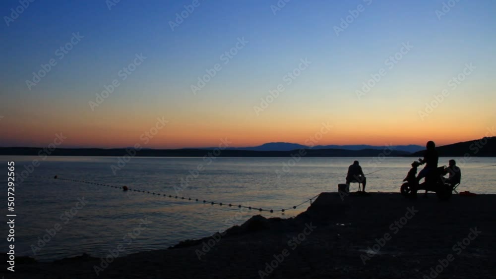 Fisherman fishing at the dark arriving night. Fisherman fishing at the dark arriving night.
