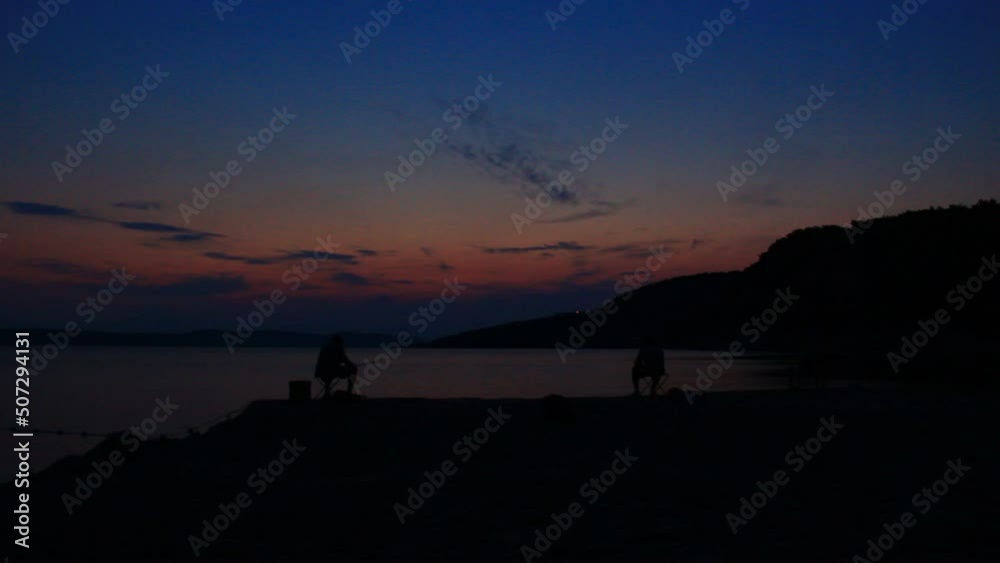 Fisherman fishing at the dark arriving night. Fisherman fishing at the dark arriving night.
