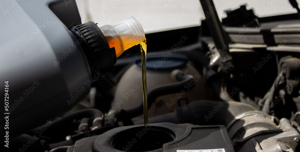 Refueling and pouring oil quality into the engine motor car Transmission and Maintenance Gear .
