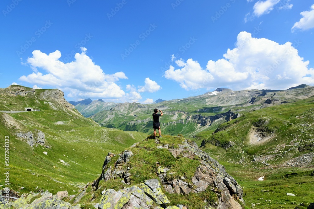 Fototapeta premium Hiking in the beautiful forest of the Alps. This is a path from mountain pass Vrsic to Slemenova spica with the look on Jalovec mountain.