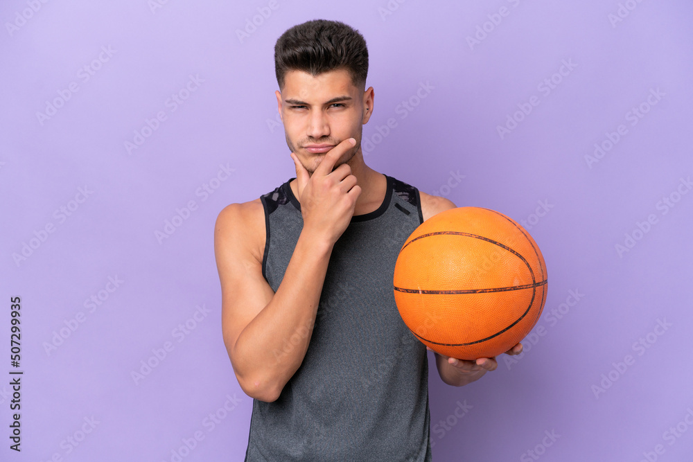 young caucasian woman  basketball player man isolated on purple background thinking