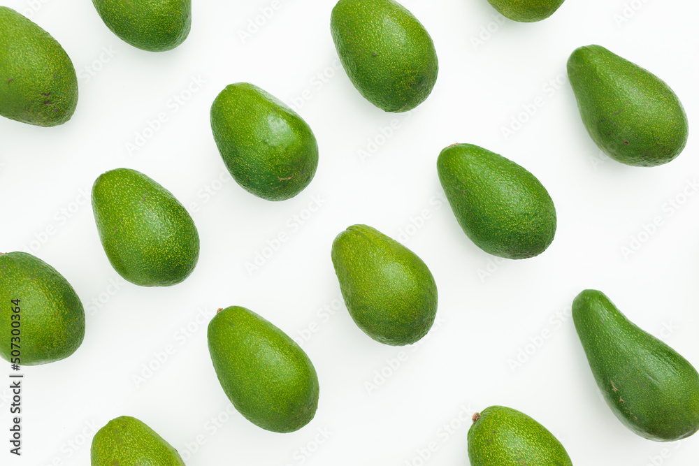 Avocado pattern on white background. Flat lay, top view Avocado pattern on white background. Flat lay, top view