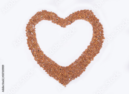 chickpeas (Bengal Gram) on white background. Close up of Organic chana or chickpea (Cicer arietinum). for design and banner. top view chickpeas. love sign.