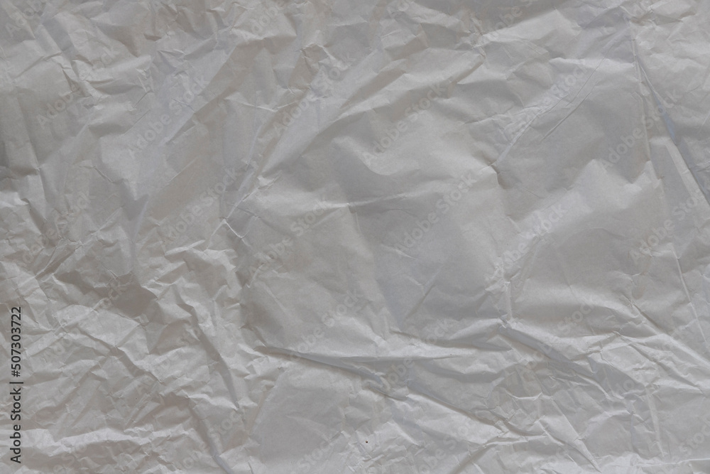 Textured design space paper background. Crumpled white paper