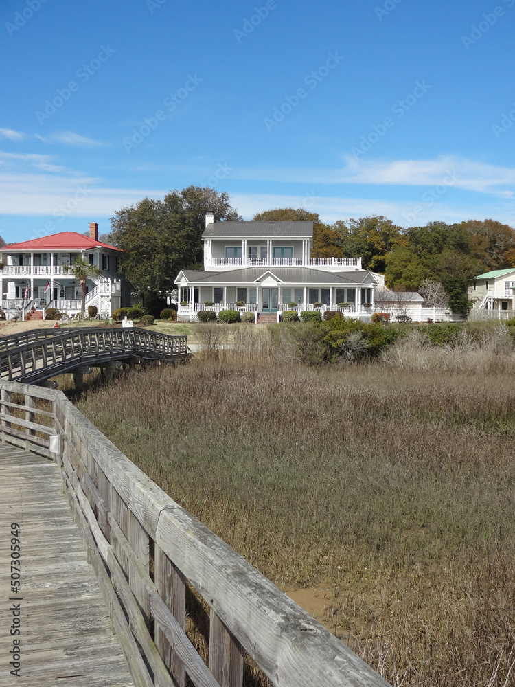 View of Southport, North Carolina (NC) homes with marsh in foreground.