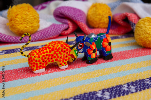 Colorful Mexican blanket and spirit animal imagery great for festive backgrounds