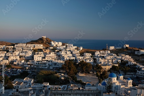 Fototapeta Naklejka Na Ścianę i Meble -  Panoramic view of the picturesque whitewashed village of Ios and the aegean sea