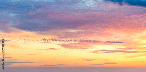 Gentle colors of Real sundown sunset  sky with beautiful light clouds