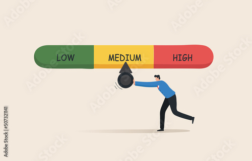 Crisis risk gauge. Risk stock, Finance, economy, inflation. Investment risk. Financial or business risk management.  Businessman tries to push the needle lower.