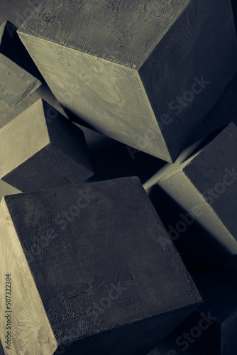 Concrete cube shape on floor background texture. Cement block as construction concept