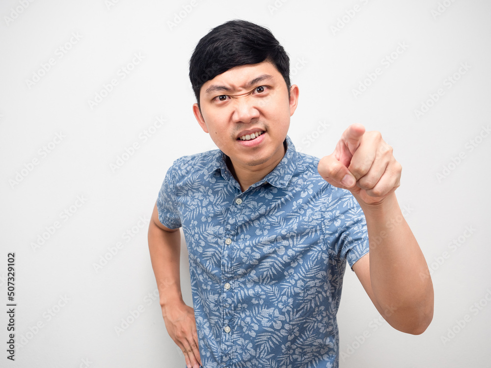 Man blue shirt gesture point finger very angry emotion portrait Man blue shirt gesture point finger very angry emotion portrait