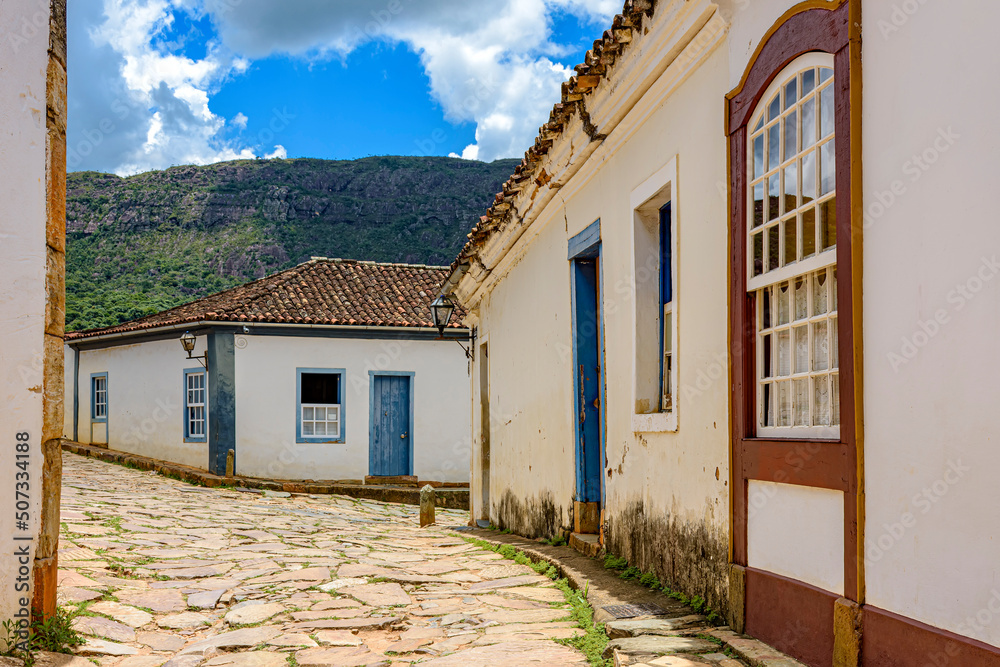 Old town street with historic colonial style houses in the city of Tiradentes in the interior of the state of Minas Gerais, Brazil