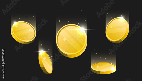 Blank golden cryptocurrency coins falling on dark background. photo