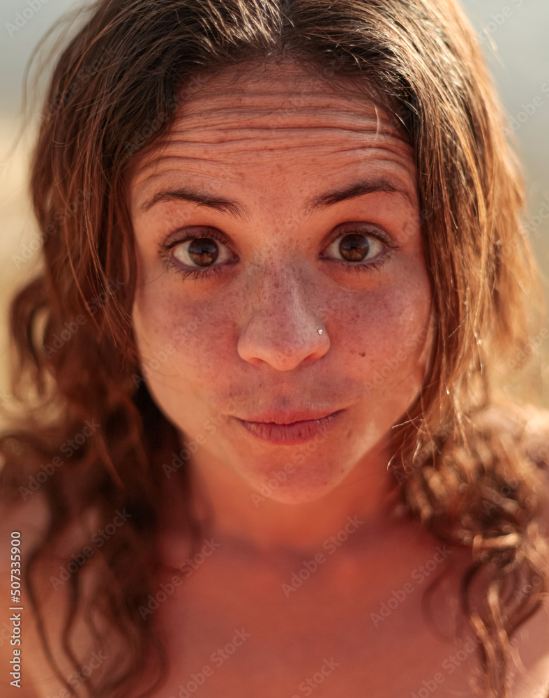 portrait of a woman looking at the camera with her eyes open portrait of a woman looking at the camera with her eyes open