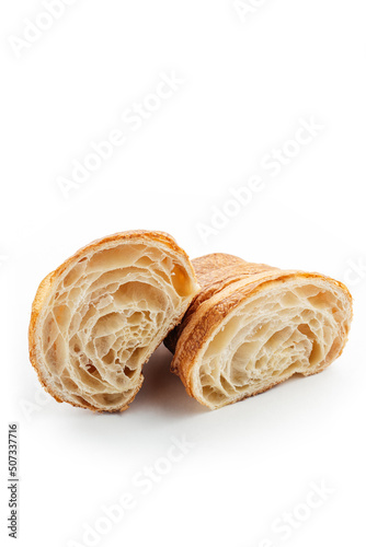 
cut croissant close-up on a white background