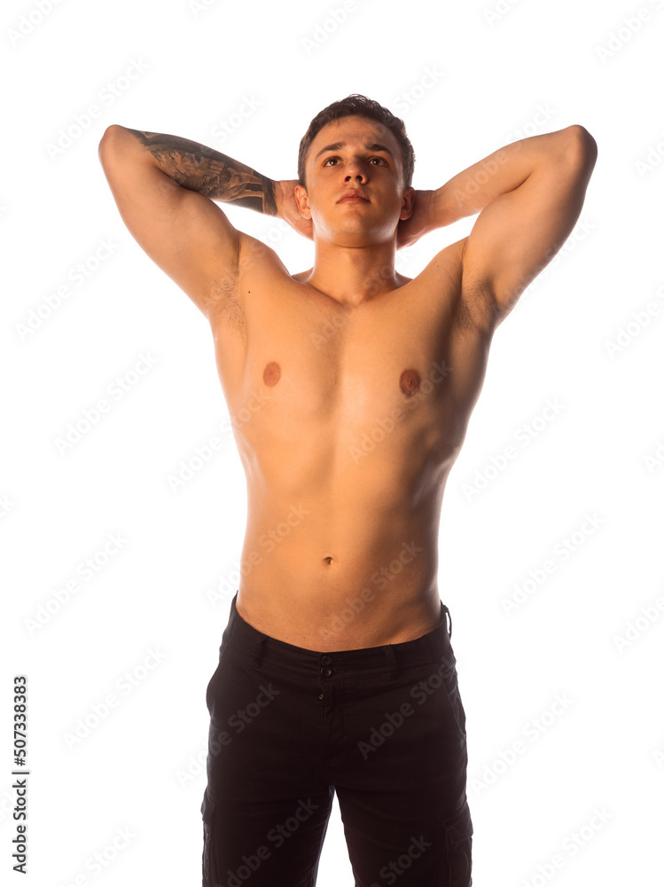 Handsome man with big muscles, posing at the camera Handsome man with big muscles, posing at the camera