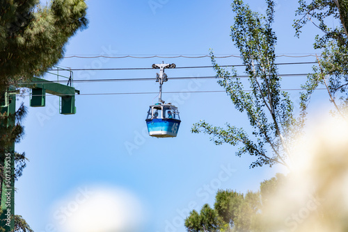 Cableway. Cable car in Madrid that connects the Parque del Oeste with the Casa de Campo in Madrid. Clear day with a blue sky, in Spain. Europe. Photography.