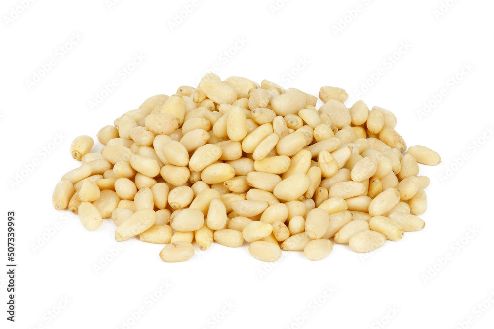 Bunch of pine nuts isolated on white background. Food rich in antioxidants. Bunch of pine nuts isolated on white background. Food rich in antioxidants.