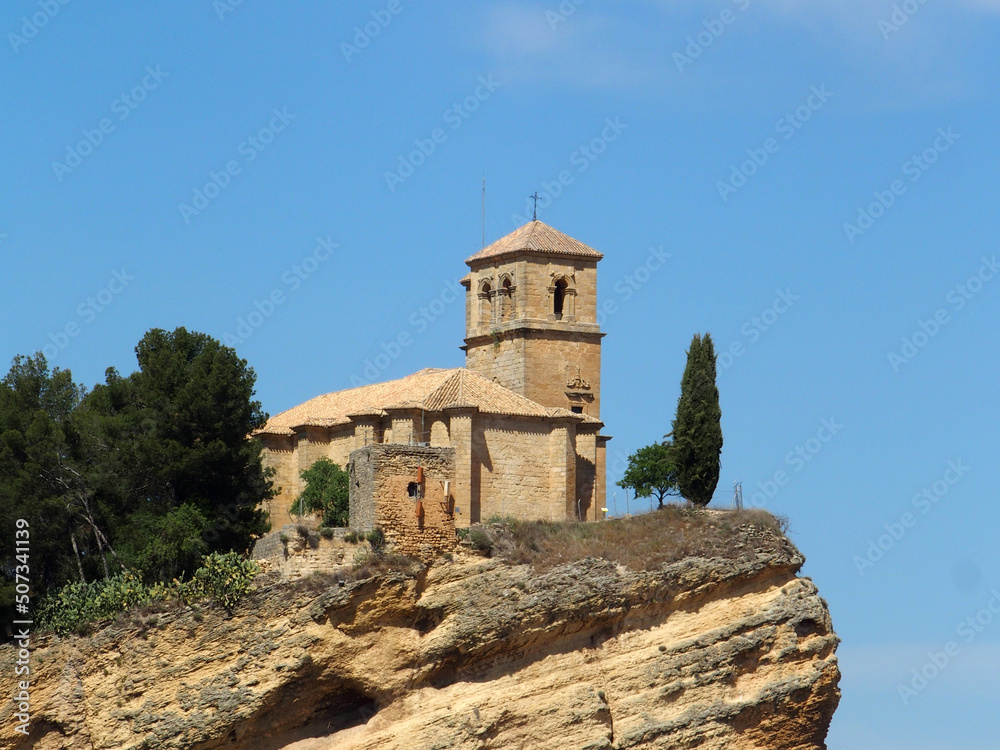 Church of Montefrío, Gothic-Renaissance temple from the 16th century. A close-up is seen at the edge of a ravine. Montefrio, Granada, Spain.