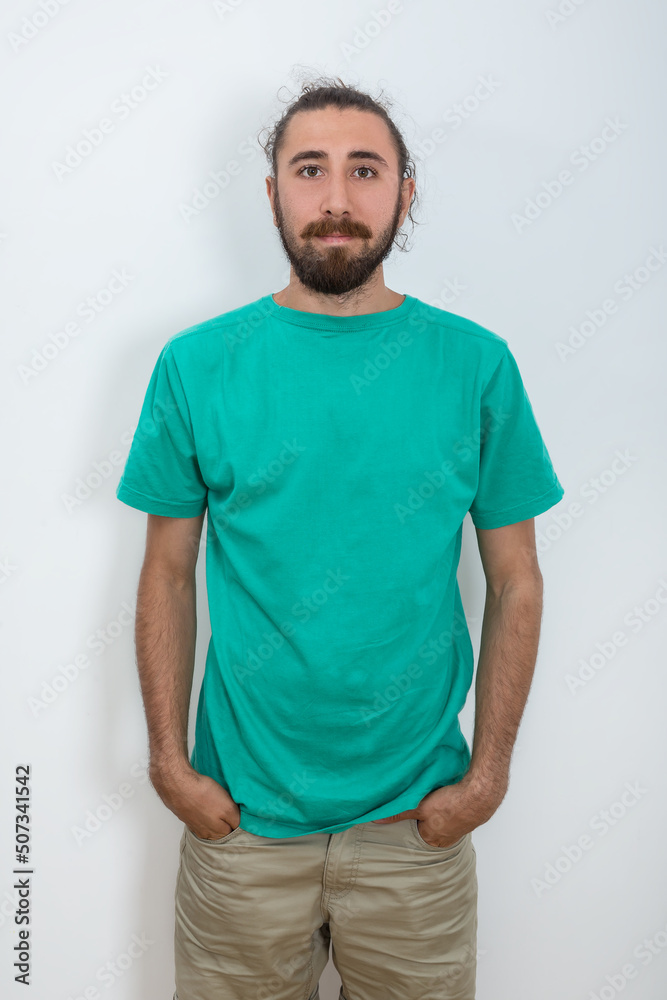 Beard man with hands in pockets Beard man with hands in pockets