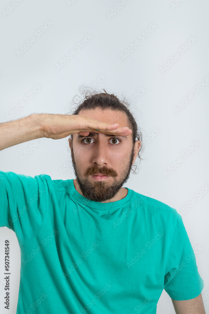 Beard man put his hand on brow Beard man put his hand on brow