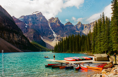 Moraine Lake in the Rocky Mountains with colourful canoes