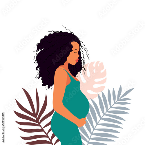 white european pregnant woman  the background of plants