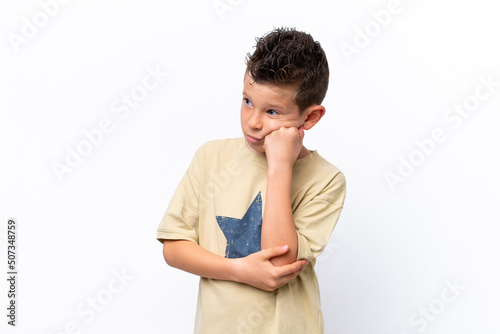 Little caucasian boy isolated on white background with tired and bored expression