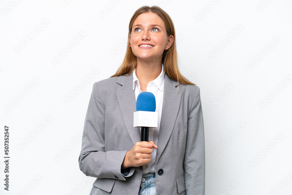 Young caucasian tv presenter woman isolated on white background thinking an idea while looking up Young caucasian tv presenter woman isolated on white background thinking an idea while looking up